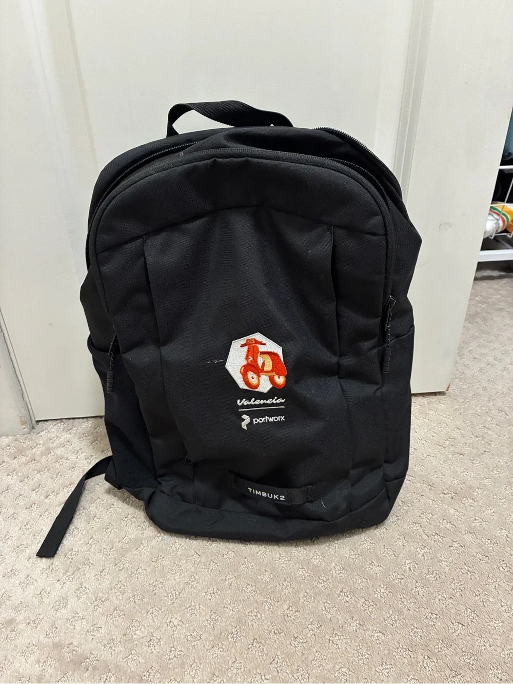 Timbuk2 Black Backpack with Orange Valencia Graphic